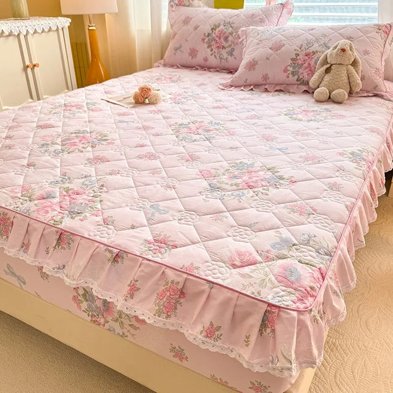 Pink floral quilted bed sheet