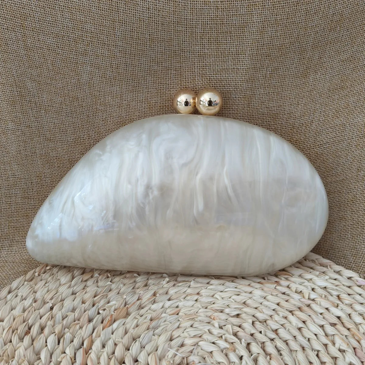 pearl oval clutch