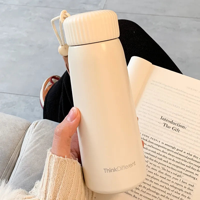 cream water bottle
