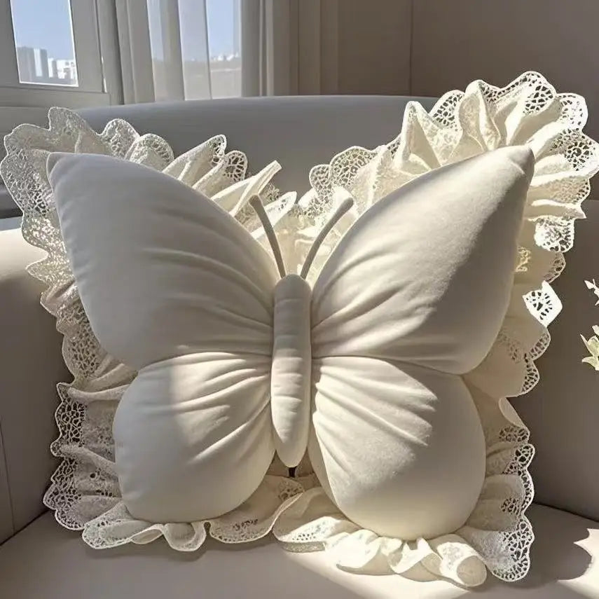 White butterfly shaped pillow with lace details