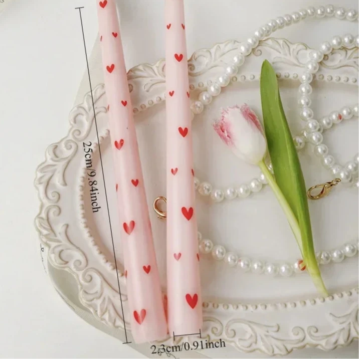 pink tall candle with red love hearts