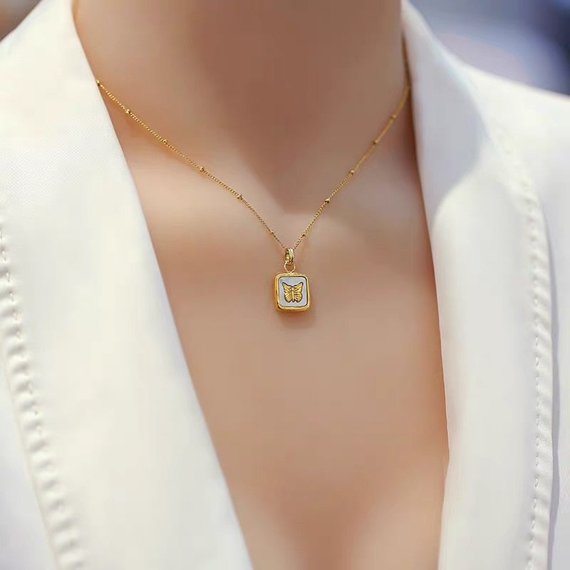 delicate gold butterfly necklace