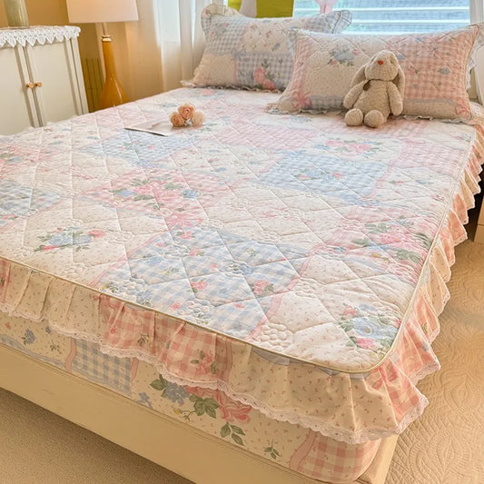 Floral quilted ruffle fitted sheet 
