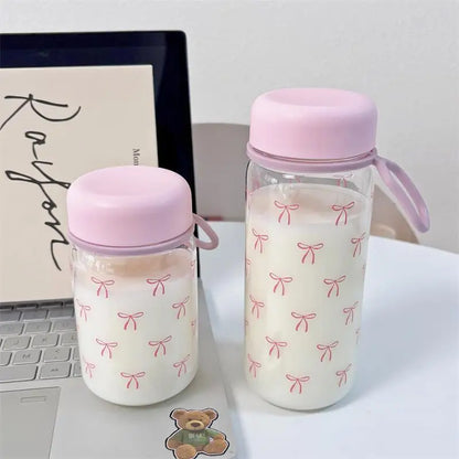 Mini glass water bottle with pink bows 