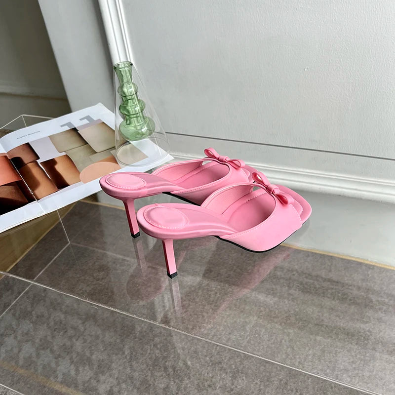 pink mules with bow 