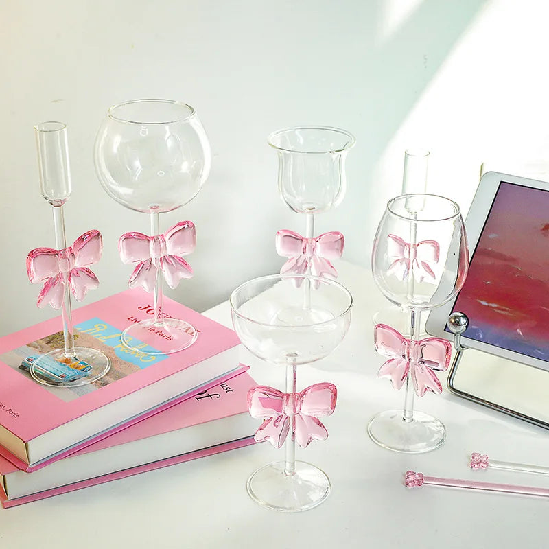 Set of wine glasses with pink bows 