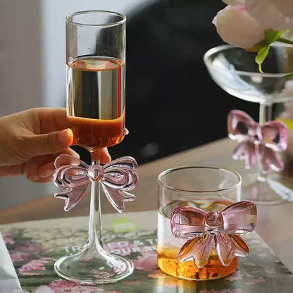 Glass with pink bow design 