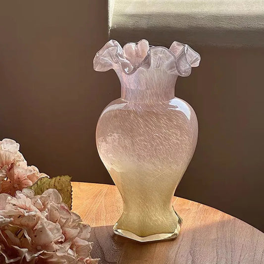 Pink glass vase with ruffle opening 