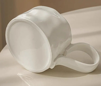 Whimsical Embossed White Ceramic Mug