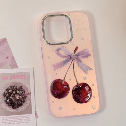 Phone case with cherries and a bow