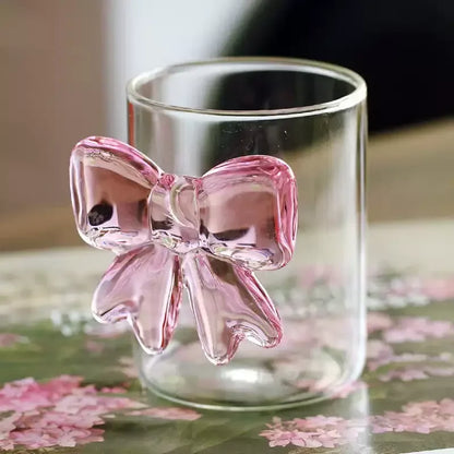 Clear glass with a pink bow 