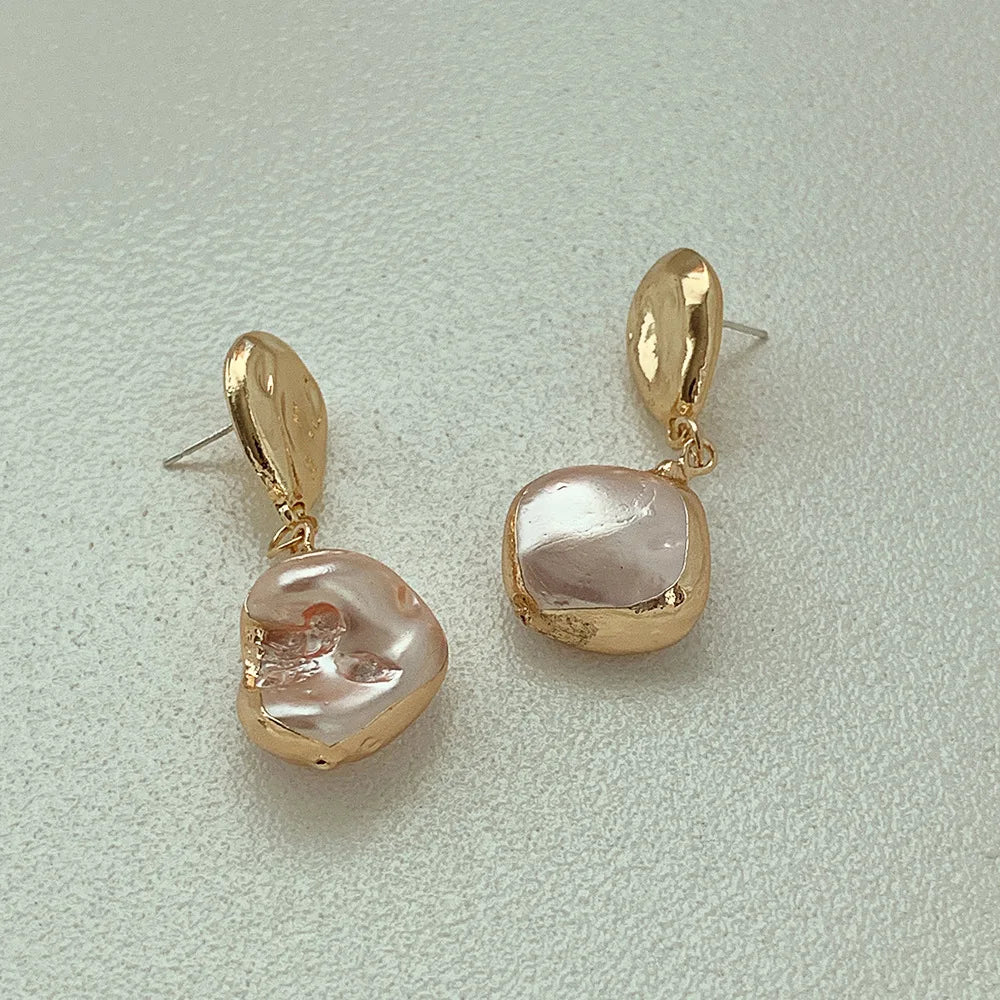 pearl effect gold earrings 