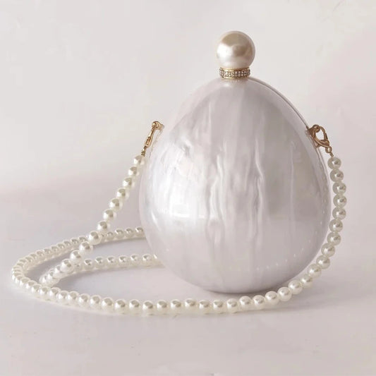 pearl oval clutch bag 
