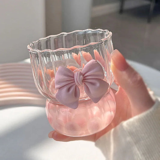 ribbed glass with pink bow 