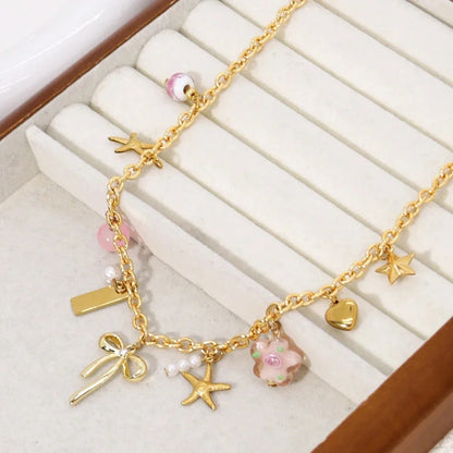 Gold Necklace With Coquette Charms