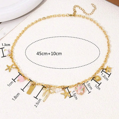 Gold Necklace With Coquette Charms