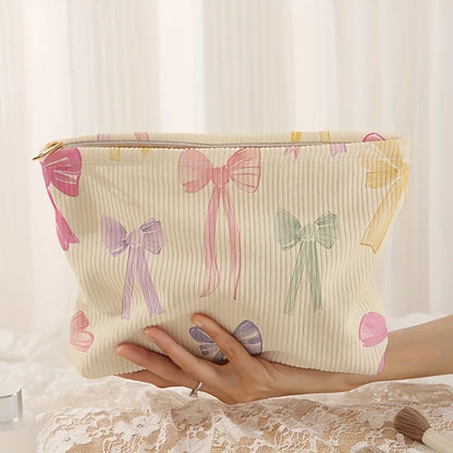 pink bow make up bag 

