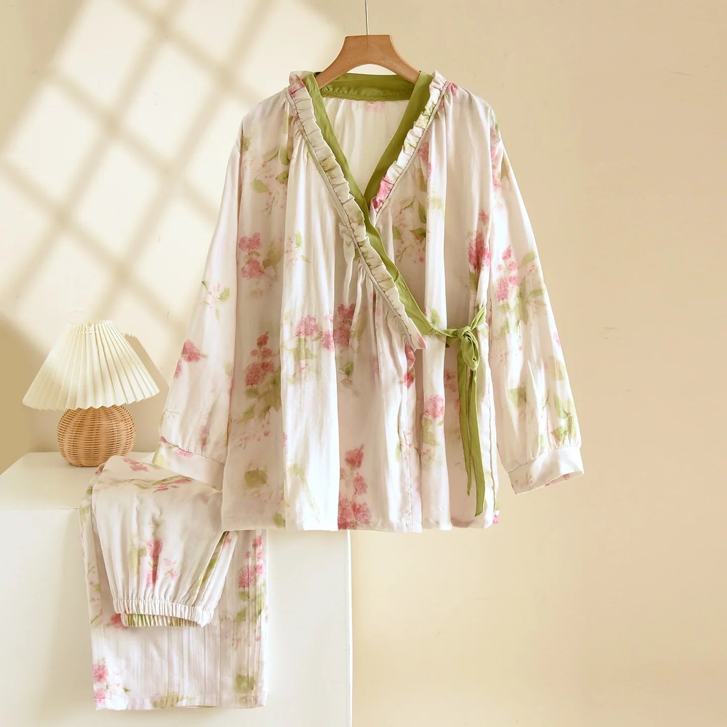 White pjs with pink and green floral print 