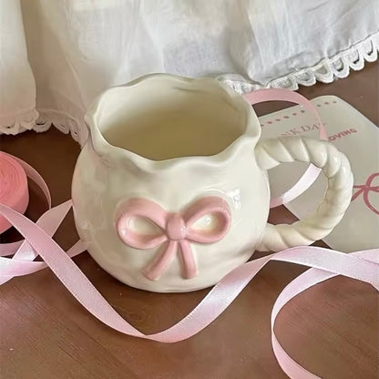irregular mug with pink bow