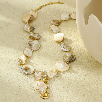 pearl and gold shell conch necklace 