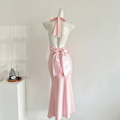 pink backless dress with bow
