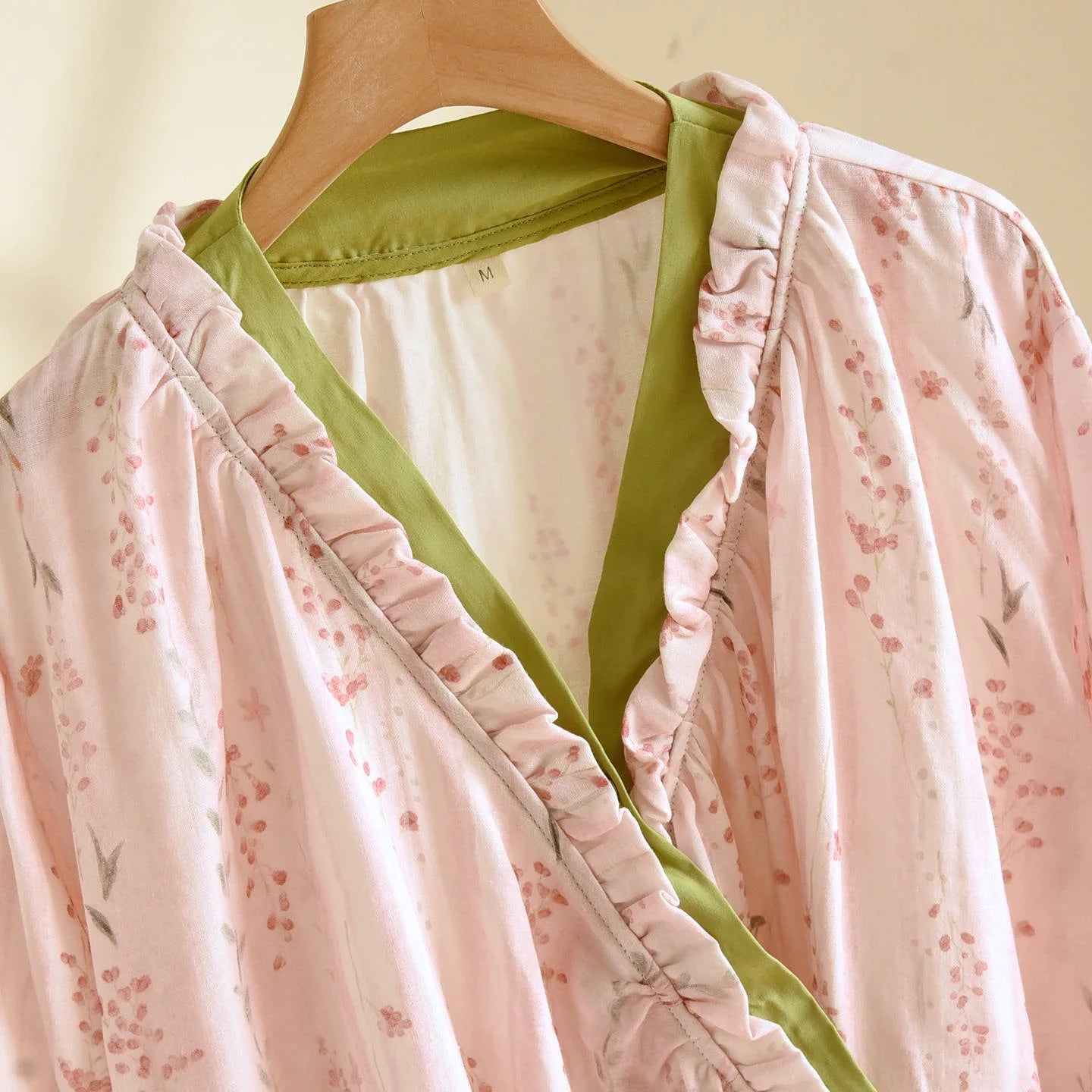 pink frilly pjs with green satin trim 