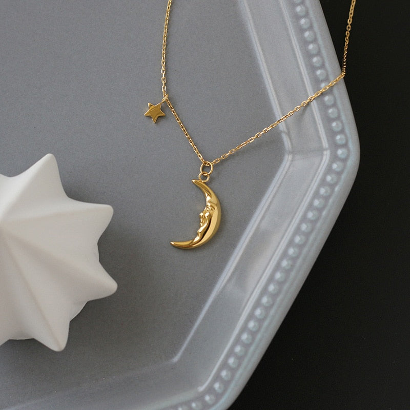 Gold moon face necklace 