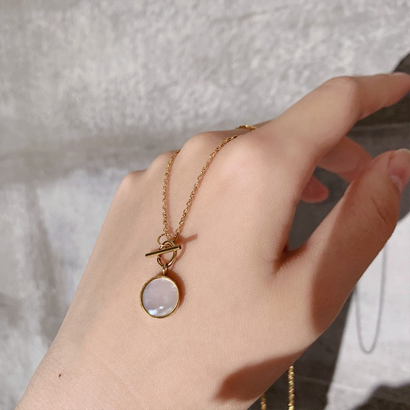 delicate gold opal necklace 