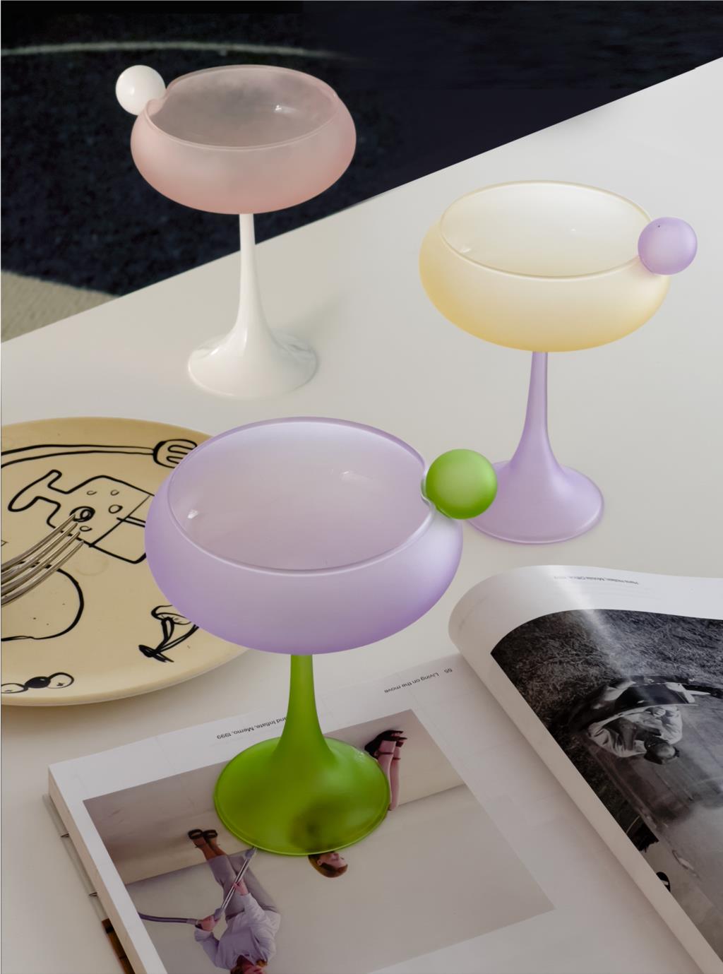 pastel coloured champagne coupes 